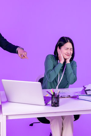 relationship and conflict between younger and older workers concept, Korean Asian young woman and manager level older manの写真素材