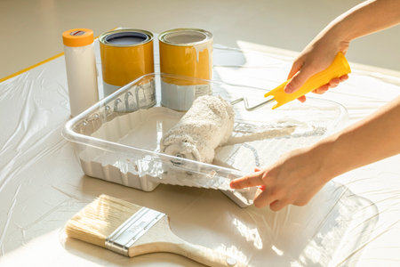 DIY interior hand motion, closeup_holding a paint roller