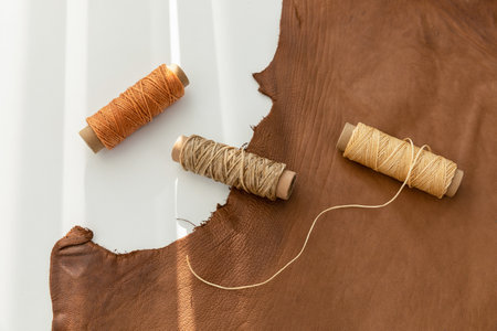 aesthetic photo of handmade, crafting hobbies, leather and wax thread toolsの写真素材