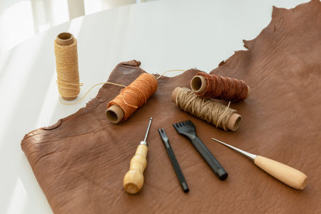 aesthetic photo of handmade, crafting hobbies, leather and wax thread tools