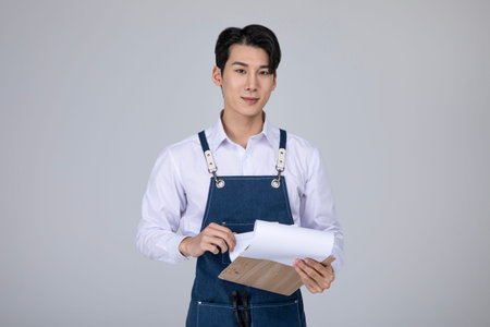 millennials and gen z, korean asian young man holding documents