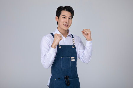 millennials and gen z, korean asian young man with hand motionの写真素材