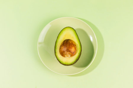 fruit still life photo, super food, avocado on a plate