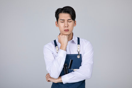 millennials and gen z, korean asian young man strugglingの写真素材
