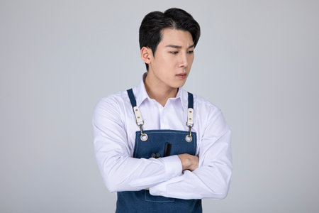 millennials and gen z, korean asian young man strugglingの写真素材