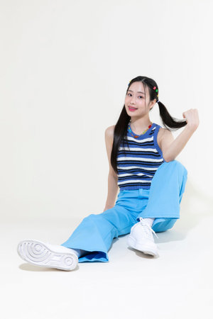 vintage y2k retro concept photo of korean asian cute woman sitting and posing