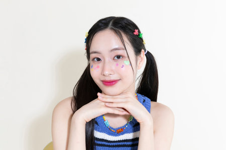 vintage y2k retro concept photo of korean asian cute woman with temporary tattoos