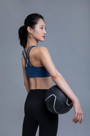 healthy beauty concept photo of korean asian beautiful woman with fitness ballの写真素材