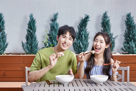 summer lifestyle, korean asian young couple with health foodの写真素材