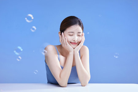 beauty concept photo of korean asain beautiful woman with soap bubbles