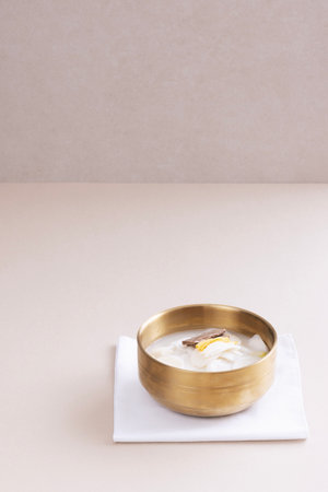 There are rice cake soup in organic bowlの写真素材