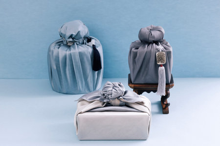 Several pieces of gift cloth are placed under the refreshments table