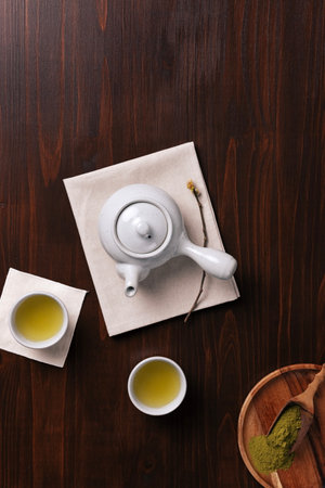 a traditional tea set with warm teaの写真素材