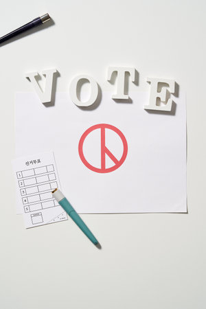 a voting mark under the English spelling of a boatの写真素材