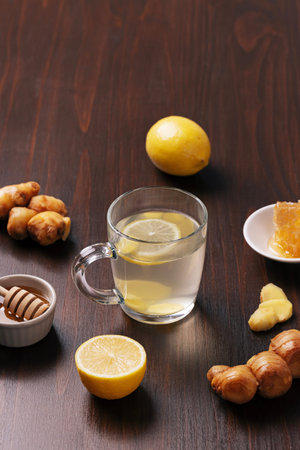 warm ginger lemon tea with honeyの写真素材