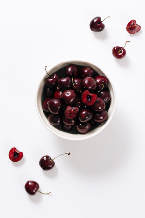 a bowlful of fresh cherriesの写真素材