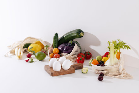 a variety of fresh salad vegetables and fruit ingredients