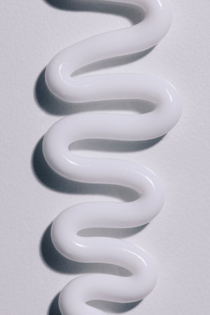 It's a cosmetic cream with a white backgroundの写真素材