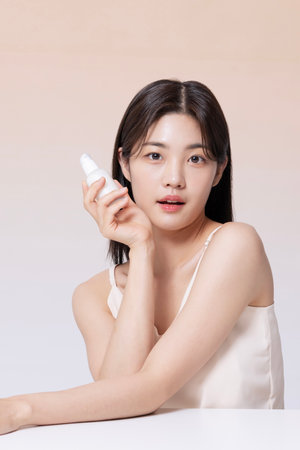 A Woman in Her 20s Posing With Cosmeticsの写真素材