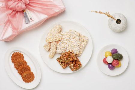 Composition of various Korean desserts and gift wrappers