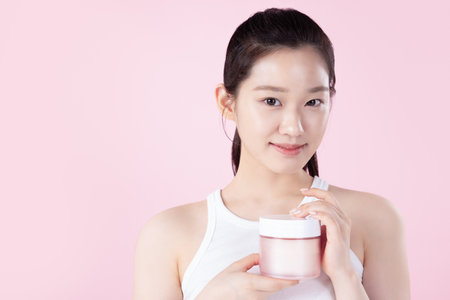 Teenage woman posing with a pack padの写真素材