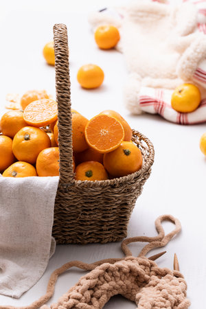 A basket full of fresh tangerinesの写真素材