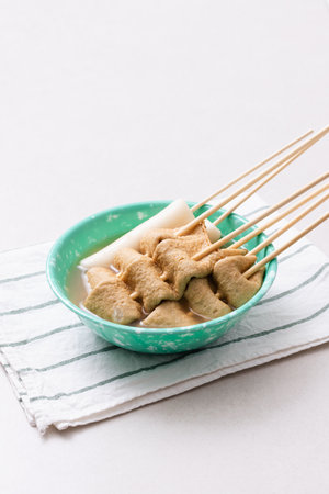 Odeng and odeng soup plated with a snack bar atmosphereの写真素材