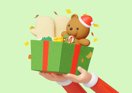 Gift box containing a teddy bear and glovesの写真素材