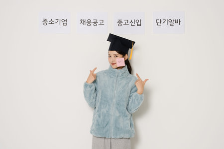 A happy student wearing a graduation cap