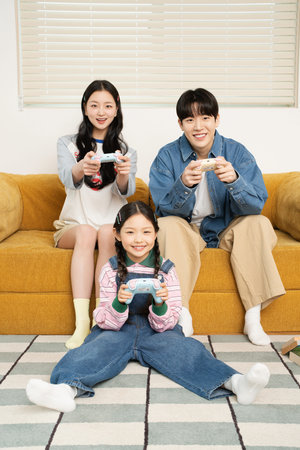 A young family playing games together