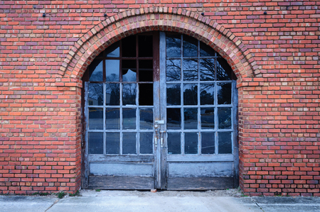 Old Brick Building With Weathered Doorの写真素材