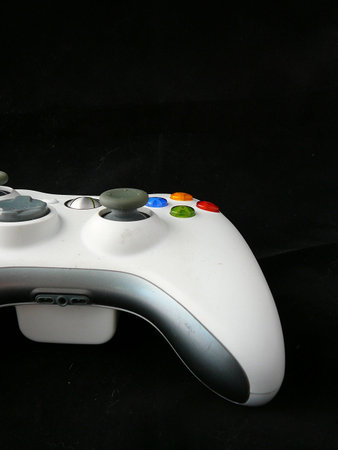 Closeup of Video Game Control over Black Backgroundの写真素材