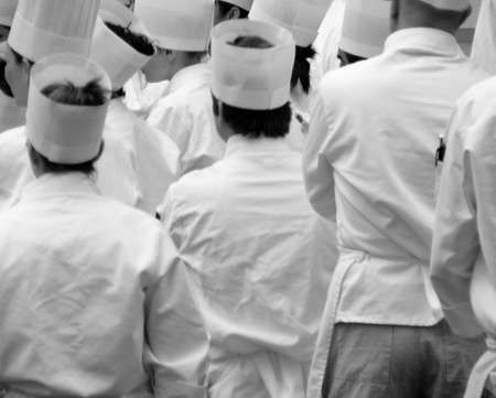 Group of Chefs standing in traditional uniform whitesの写真素材