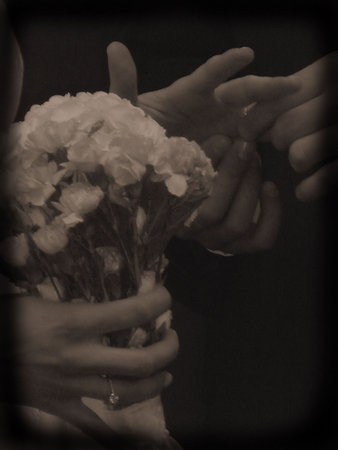 Still Life of Bride and Groom Exchanging Rings in Weddingの写真素材