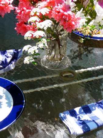 Still life of garden lunch on sunny springtime afternoonの写真素材