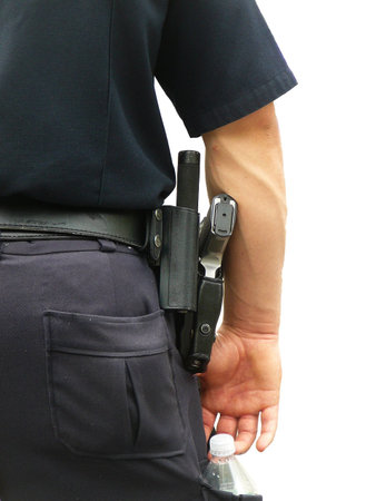 Detail of Policeman's Uniform: Gun and Bottled Water on Holster Isolated on White Backgroundの写真素材