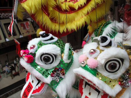 Chinese dragon puppets celebrating the Chinese New Year holidayの写真素材