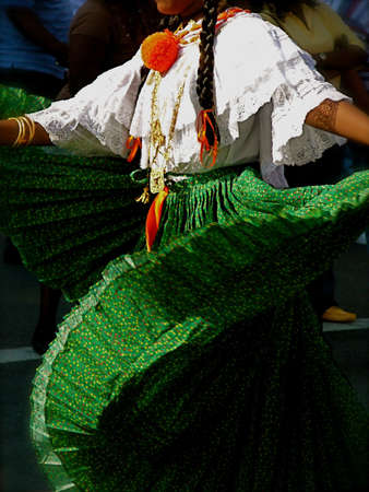 Traditional Folk Dancer in Green Pleated Skirt Performs in outdoor festival, Brooklyn, New Yorkの写真素材