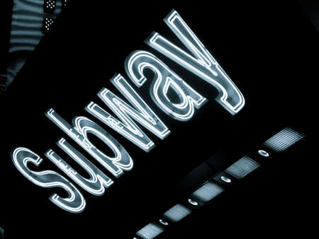 Neon Subway Sign in Times Square, New York Cityの写真素材