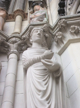 Figure of Saint on Facade of Saint John the Divine Cathedral, New York City. Largest cathedral in...