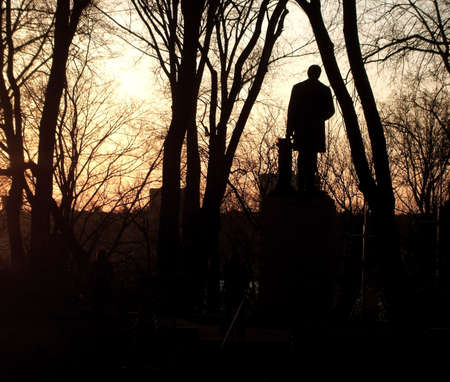 Silhouette of Male Statue in Riverside Park at Sunset, New York Cityの写真素材