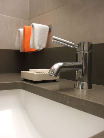 Bathroom Still Life: Modern Faucet and Sinkの写真素材