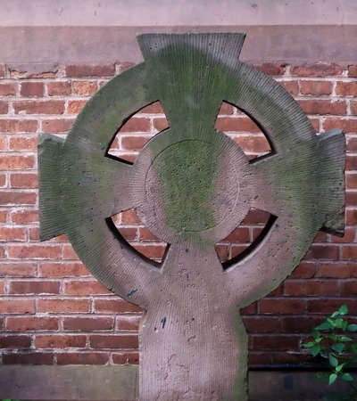 Simple Celtic Cross Headstone in Historic Cemeteryの写真素材