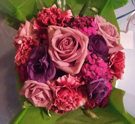 Colorful Bouquet of Pink and Purple Roses and Wildflowersの写真素材
