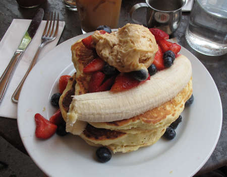 A Breakfast Plate of Pancakes and Fruitの写真素材