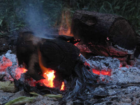 Closeup of summertime evening camp fireの写真素材