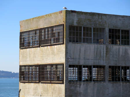 Empty and abandoned industrial warehouse building exteriorの写真素材