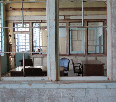 Empty and abandoned office interior with furnitureの写真素材