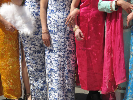 Line of bridesmaids at Asian wedding in colorful dressesの写真素材