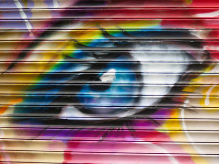 Painted Wall: Colorful Abstract Eye in Detail of Graffitiのeditorial素材